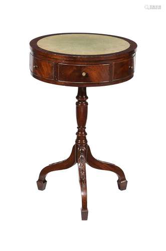 A mahogany drum table in George III style