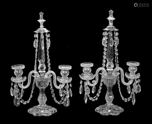 A pair of Edwardian cut glass table candelabra