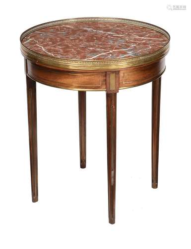 A French mahogany and brass inlaid occasional table in Direc...