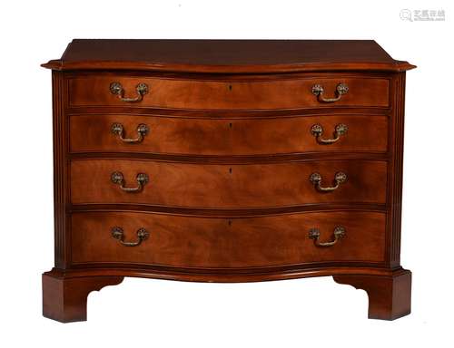 A mahogany serpentine chest in George III style