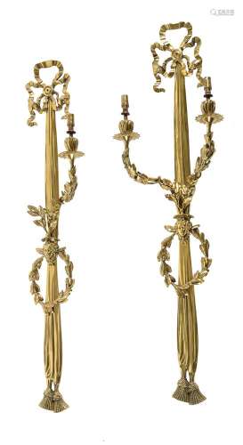 A pair of gilt-metal two-branch wall lights in Louis XV styl...