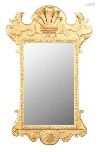 A giltwood wall mirror in George II style