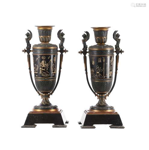 A pair of Egyptian Revival urns