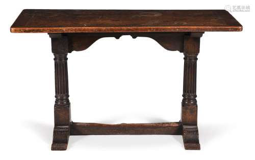 A carved oak tavern table