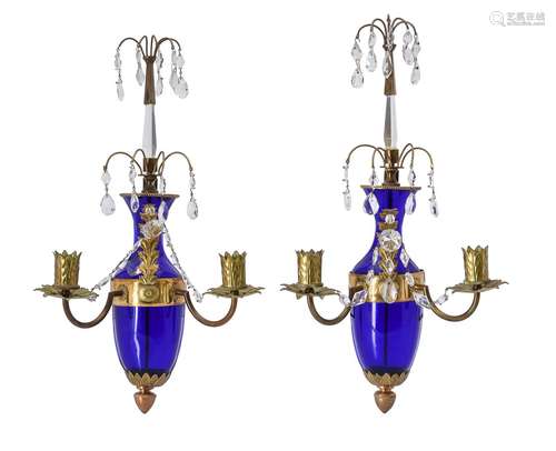 A pair of Baltic blue glass two light wall lights