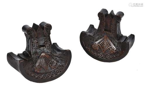 A pair of Mapuche (Chile) carved wood ceremonial stirrups