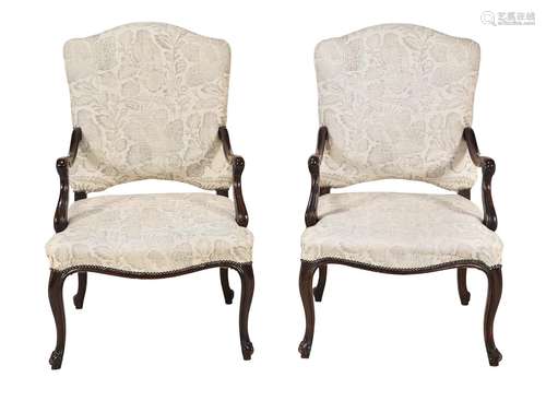 A pair of stained beech armchairs in Continental early 18th ...