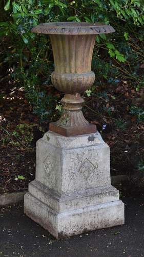 A cast iron Campana vase