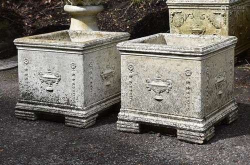 A pair of composition stone planters