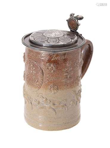 A London stoneware inscribed and dated Royal tankard