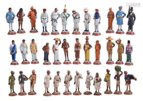 A group of 36 painted plaster figures depicting the Indian s...