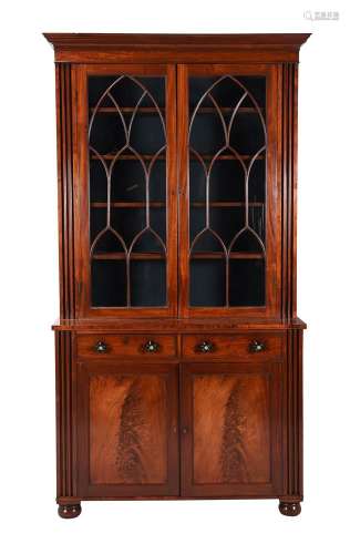 An early Victorian mahogany cabinet bookcase