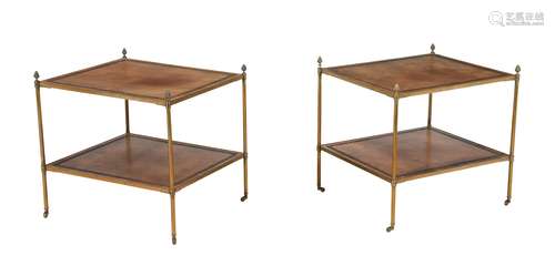 A pair of brass and tooled leather inset two tier etageres i...