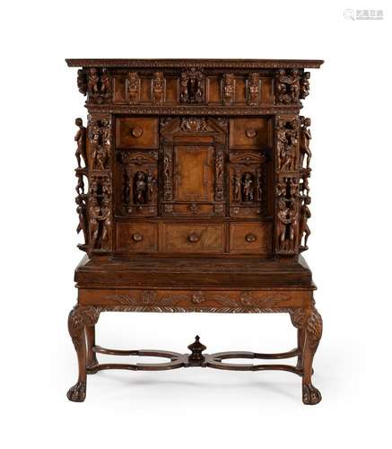 A carved walnut cabinet