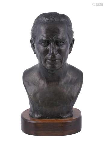 A bronzed composition bust of Edward Johnson