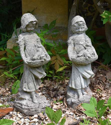 Two similar stone composition models of girls