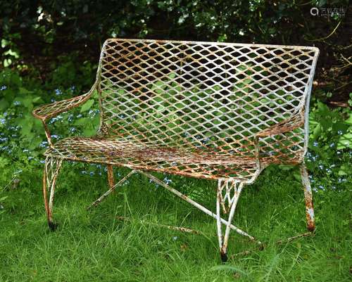 A light blue painted metal garden seat, possibly French