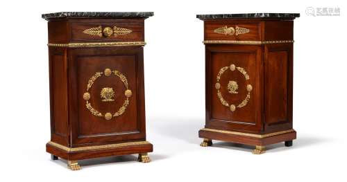 A pair of French mahogany and giltmetal mounted bedside cabi...