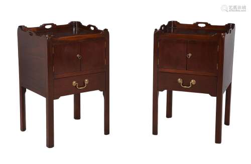 A pair of mahogany bedside tables in George III style