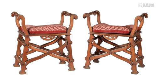 A pair of Reformed Gothic walnut X-framed stools or window s...