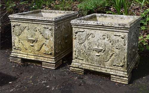 A pair of composition stone planters