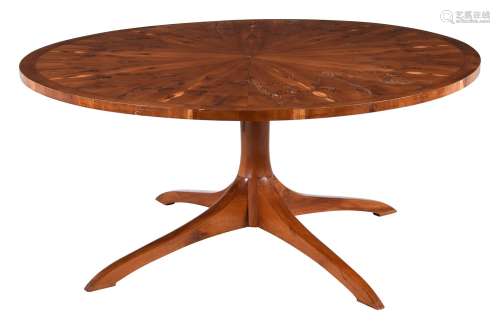 A yew circular dining table