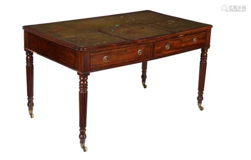 A Regency mahogany and ebony strung library or writing table