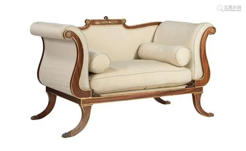 A mahogany and parcel gilt sofa