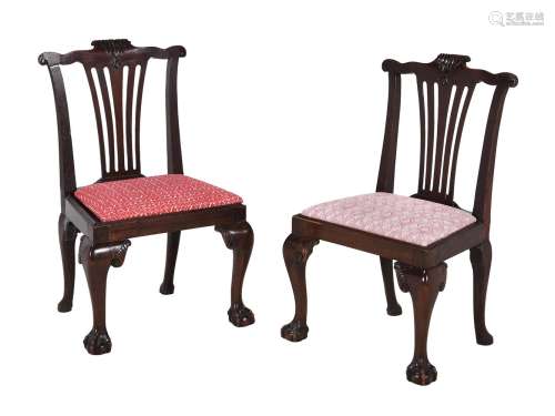 A pair of mahogany low side chairs