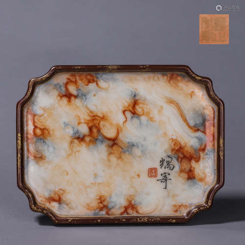 A glazed porcelain tea tray