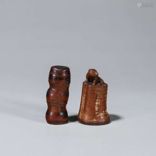 2 carved bamboo seals