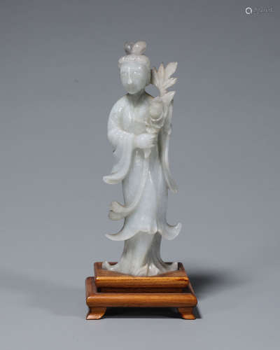 A jade carved figure ornament