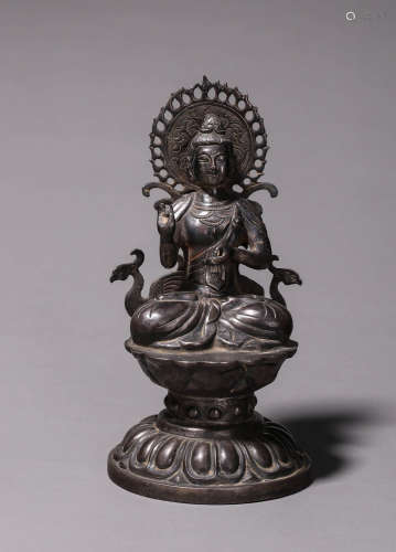 A silver Sakyamuni buddha statue
