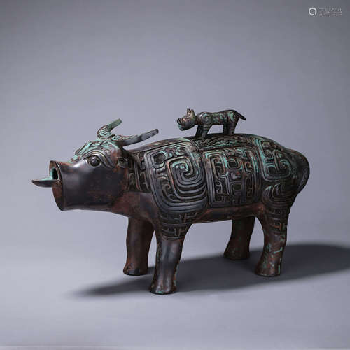 A taotie patterned bronze ox zun