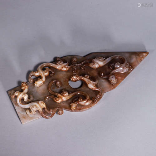 A dragon patterned Hetian jade ornament