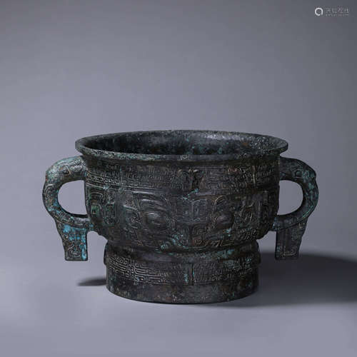 A taotie patterned double-eared bronze pot