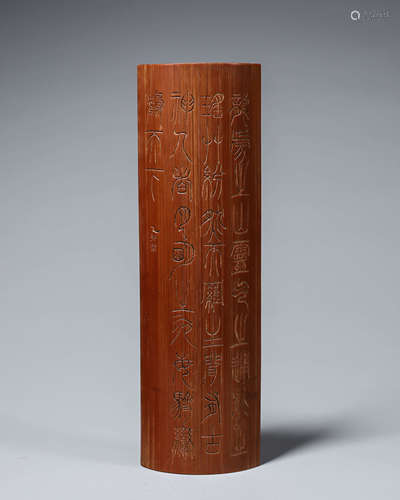 A bamboo inscribed armrest