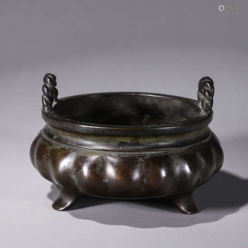 A three-legged double-eared copper censer