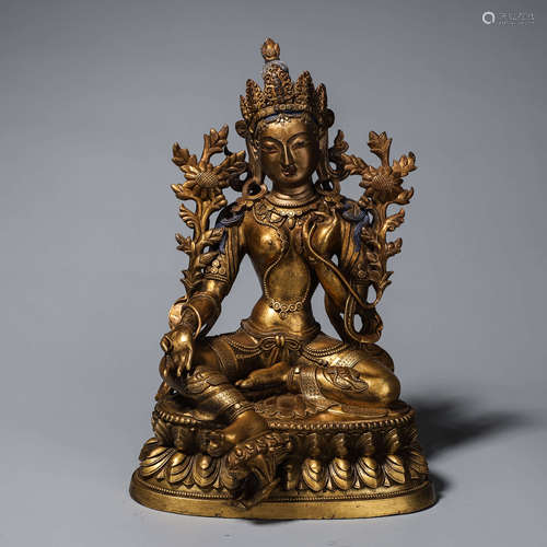 A gilding copper buddha statue