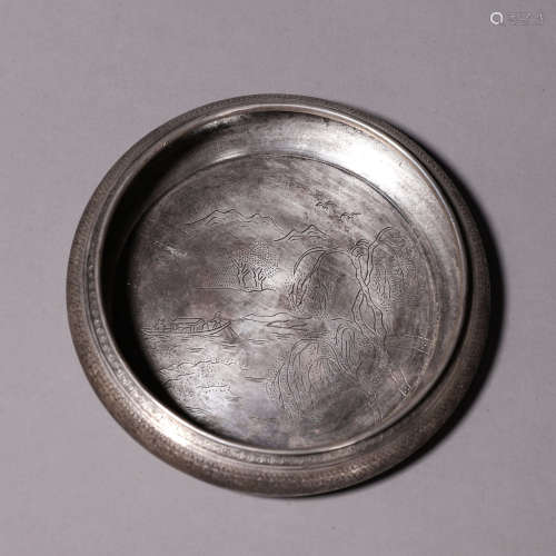 A boat patterned silver water pot