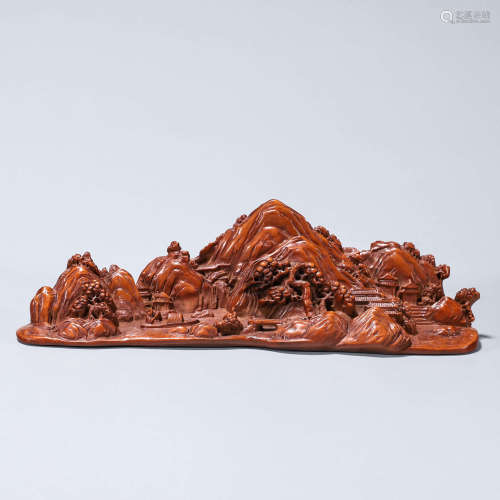 A carved boxwood brush stand