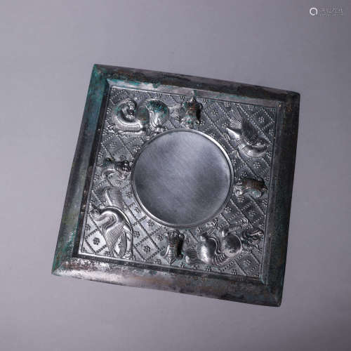 A beast patterned squared bronze mirror