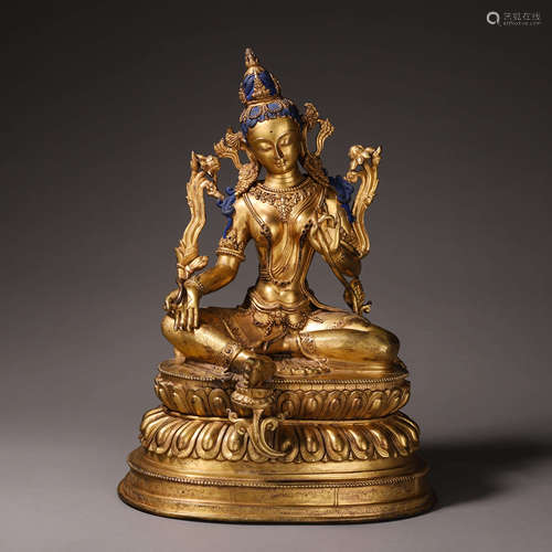 A gilding copper buddha statue