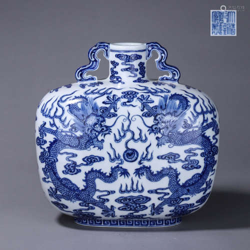 A blue and white cloud and dragon porcelain flask