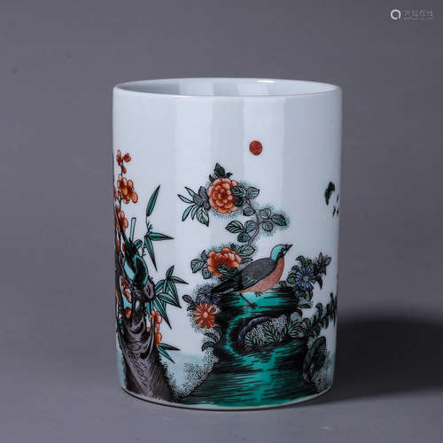 A multicolored bird and flower porcelain brush pot