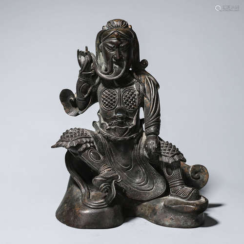 A copper Guangong statue