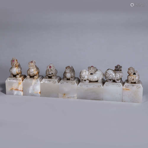 A set of Hetian jade silver-inlaid beast seals