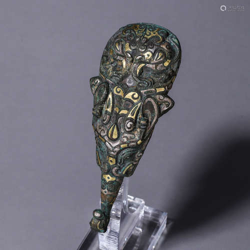 A bronze dragon head hook