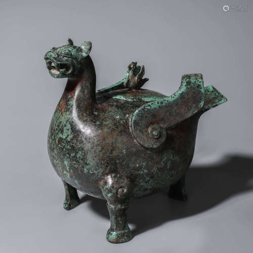 A bronze bird shaped zun