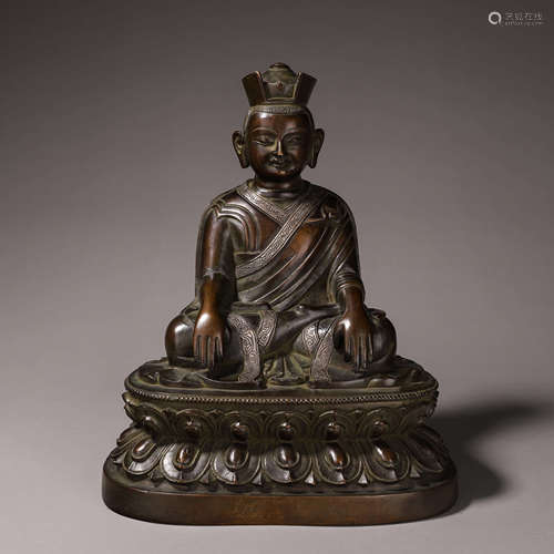 A copper Tsongkhapa buddha statue